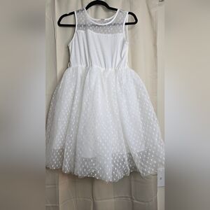 Elegant White Dress with Textured Overlay